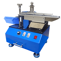 Capacitor pin cutting machine